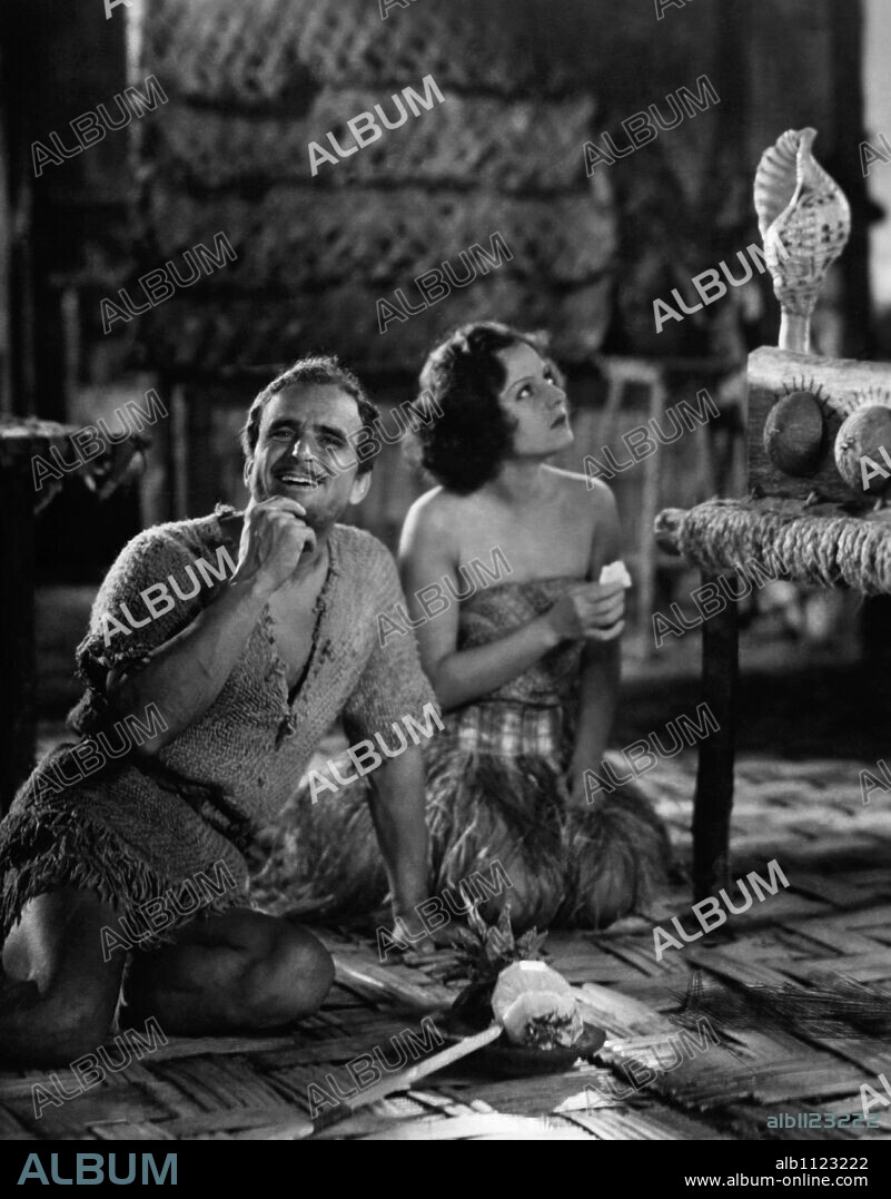 DOUGLAS FAIRBANKS and MARIA ALBA in MR. ROBINSON CRUSOE, 1932, directed by A. EDWARD SUTHERLAND. Copyright UNITED ARTISTS.