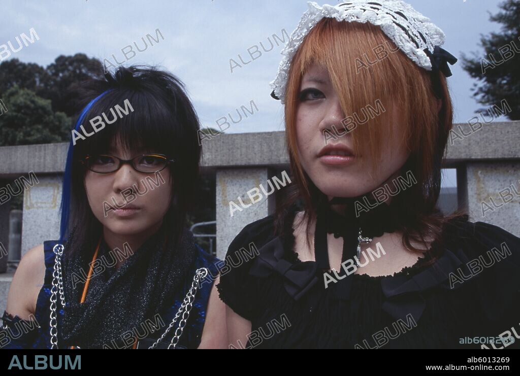 JAPAN Honshu Tokyo Harajuku District. Two teenage girls dressed in Japanese punk style.