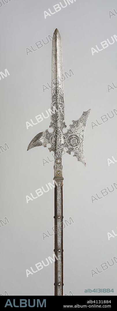 Halberd for the Bodyguard of Wolf Dietrich von Raitenau, Prince-Archbishop of Salzburg. Austrian. Date: 1580-1600. Dimensions: L. 222.9 cm (87 3/4 in.)
Blade with socket L. 61.2 cm (24 1/8 in.)
Wt. 6 lb. 3 oz. Steel and oak. Origin: Salzburg.