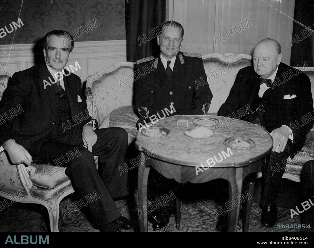 Tito, Churchill And Eden At Embassy Luncheon -- Marshal Josip Broz Tito, head of the Yugoslav state, with British Premier Winston Churchill and Foreign Minister Anthony Eden at the luncheon given at the Yugoslav Embassy in Kensington, London, to-day (Thursday). March 19, 1953. (Photo by Reuterphoto).
