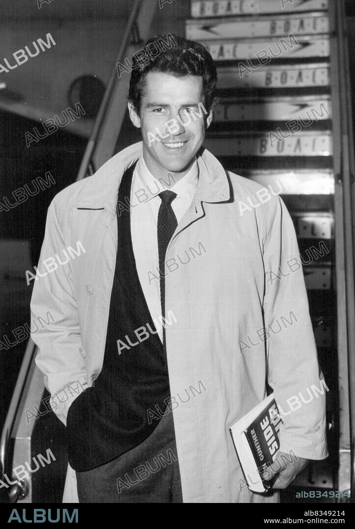 Mr. Werschkul, alias Gordon Scott, but soon to be known as the latest of a long line of Tarzans, recently arrived by B.O.A.C. "Monarch" service at London Airport from New York.Mr. Scott is here for the interior shooting of the film "Tarzan and the Lost Safari", which is the first in this series of films to be made in color. The famous jungle lord, created by author Edgar Rice Burroughs, appeared originally on the screen in 1918 and has been played by a series of muscular actors including Olympic swimming champion, Johnny Weismuller.The youngest of nine children, five boys and four girls, Gordon Scott is 6' 3", has an expanded chest measurement of 50" and a 30" waist. He was born in Portland, Oregon, in 1927, and this will be his second film. December 6, 1955. (Photo by BOAC).