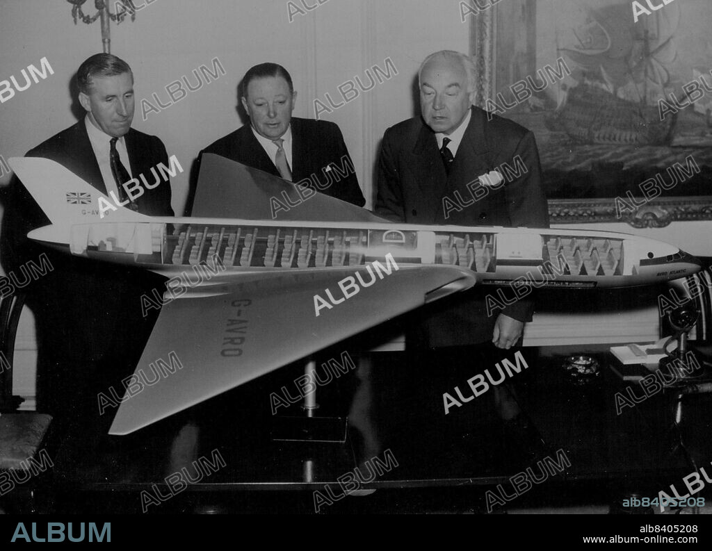 "Avro Atlantic" is Britain's New Bid For World Air Supremacy.Sir Miles Thomas, Chairman of the British Overseas Airways Corporation (right) and Sir Roy H. Dobson, head of A.V. Roe and Company (Centre), and Mr. Stuart Davies, Chief Designer of A.V. Roe, looking at a large-scale model of the world's fist four-jet delta transport, the "Avro Atlantic", details of which have just been released.The plane can cross the Atnaltic non-stop between London and New York in five to seven hours, cruising at over 600 miles an hour at 40,000-feet, carrying between 76 and 131 passengers. June 11, 1953. (Photo by United Press Photo).