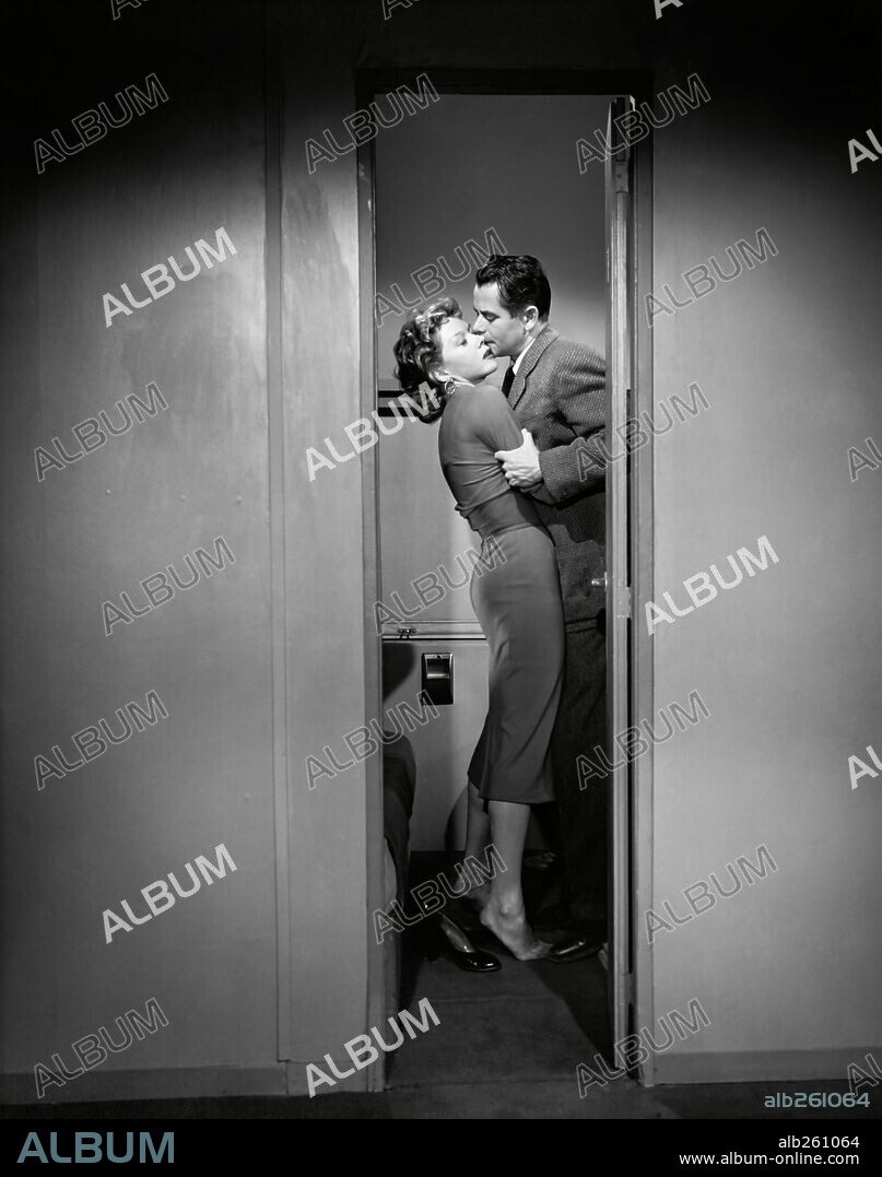 GLENN FORD and GLORIA GRAHAME in HUMAN DESIRE, 1954, directed by FRITZ LANG. Copyright COLUMBIA PICTURES.