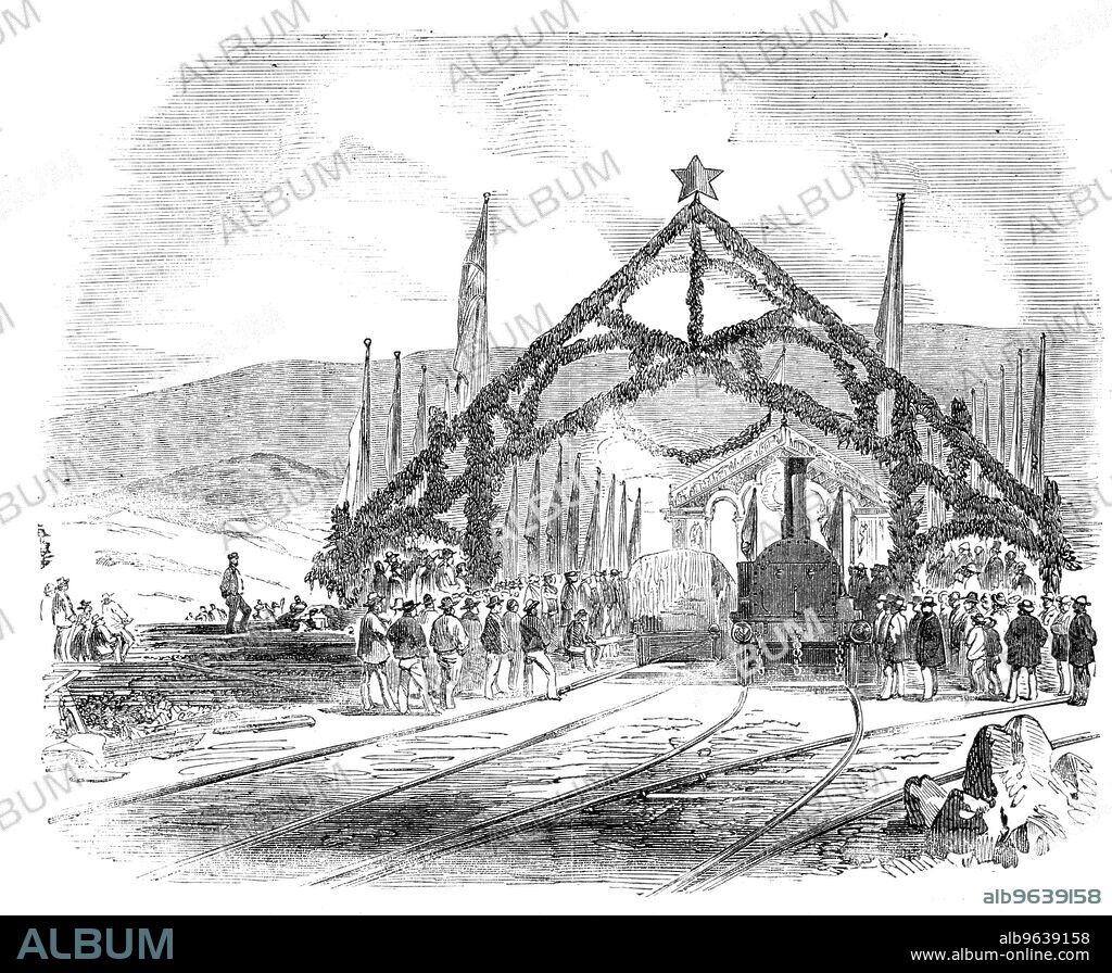 Opening of the Valparaiso and Santiago Railway - Train leaving the Valparaiso Station, 1856. View after a photograph by 'Mr. Martineau, one of the engineers of the line...The inauguration of the first eight miles...took place on the 16th of September...in the presence of about twenty thousand people...The station had been prettily decorated with triumphal arches...the locomotives were introduced, and the ceremony of the benediction took place, the Bishop spreading his hands out towards the engines, and sprinkling them with holy water...Immediately after the ceremony had taken place the Governor of Valparaiso, the Bishop, the Directors of the Railway, and about 500 guests, started in a train along the line - the engine (La Empressa), which was gaily decorated with Chili flags, being driven by Mr. Lloyd, the chief engineer of the Railway'. From "Illustrated London News", 1856.
