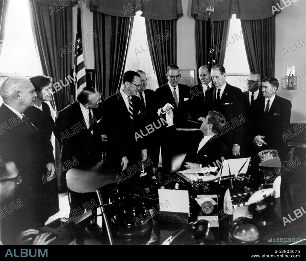 On October 10, 1962, after the 1961 thalidomide tragedy, President Kennedy signed the Kefauver Harris Drug Amendments to the 1938 Food, Drug, and Cosmetic Act. Those looking on include Frances Kelsey, second from left, the FDA medical officer who refused to approve the new drug application for Kevadon, the brand name for thalidomide in the United States. This amendment required that new drugs be approved on the basis of evidence submitted to FDA from pre-marketing clinical studies demonstrating not only safety, but efficacy as well. FDA's implementation of the new requirement, upheld by the Supreme Court, revolutionized the drug supply of the US in the decades to follow. John Fitzgerald Kennedy (May 29, 1917 - November 22, 1963) was the 35th President of the United States, serving from 1961 until his death in 1963. He was the youngest elected to the office, at the age of 43, and the first person born in the 20th century to serve as president. He was the only Catholic president, and is the only president to have won a Pulitzer Prize. Kennedy was assassinated on November 22, 1963 in Dallas, Texas by Lee Harvey Oswald. He continues to rank highly in public opinion ratings of US presidents.