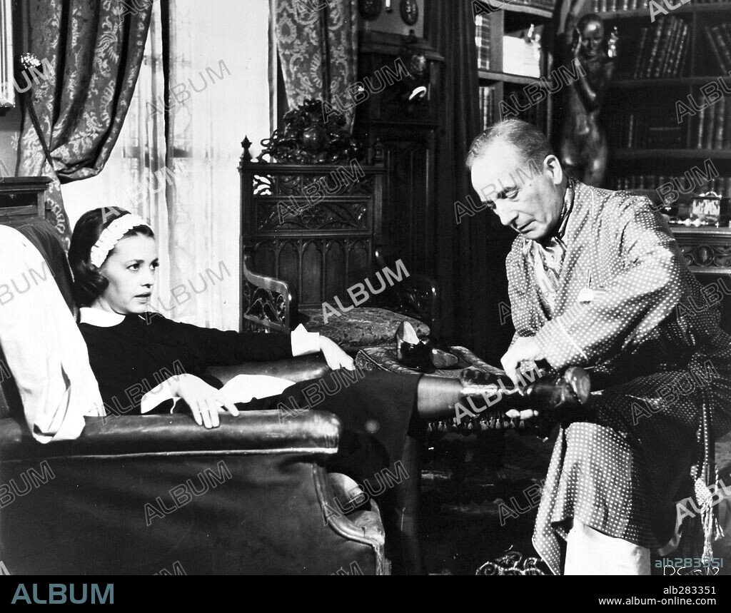 JEAN OZENNE and JEANNE MOREAU in DIARY OF A CHAMBERMAID, 1964 (LE JOURNAL D'UNE FEMME DE CHAMBRE), directed by LUIS BUÑUEL. Copyright SPEVA/CINE ALLIANCE/FILM SONOR/DEAR.