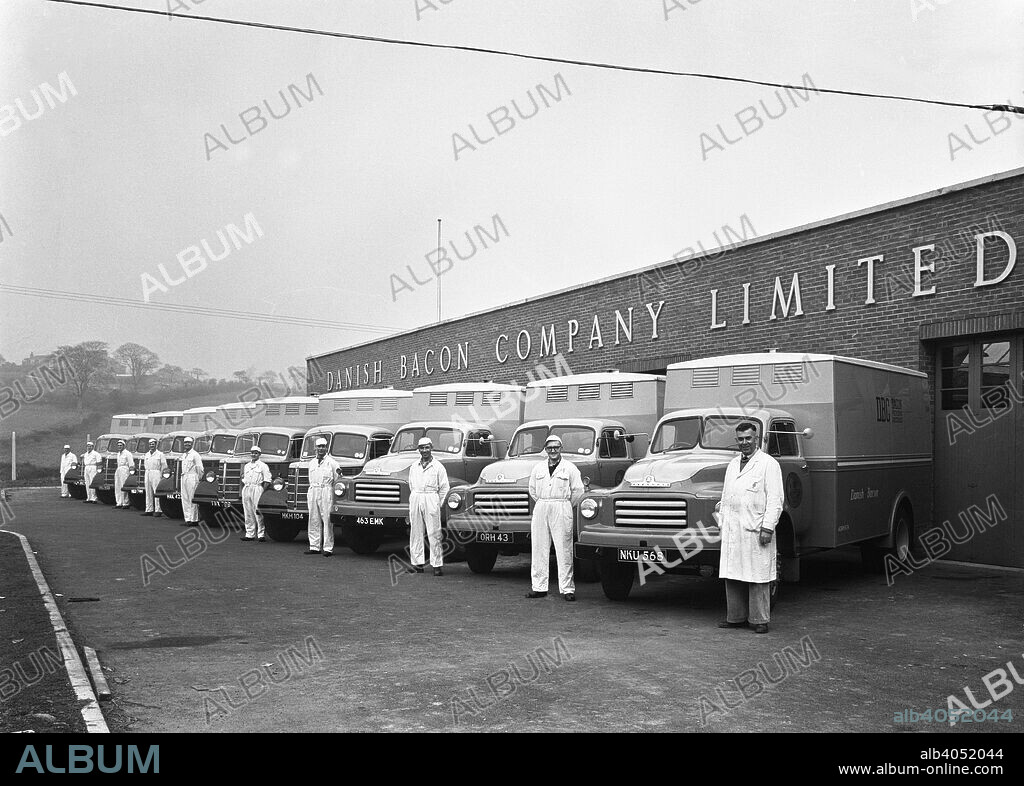Bedford delivery lorries at the Danish Bacon Co, Kilnhurst, South Yorkshire, 1957. The fleet of Bedford delivery lorries which operated from the Danish Bacon Company's Kilnhurst depot during 1957. Due to its central location near Rotherham and its proximity to the A1 and the North Sea ports, Kilnhurst was an ideal base for the company. The photograph was commisioned by the Michelin Tyre company, who supplied tyres for the vehicles at the time.