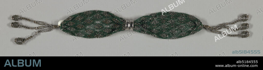 Miser's purse, Medium: silk, metal Technique: netting, Dark green silk net in which six threads cross each other at intervals forming diamond shapes, which are wholly covered by cut steel beads. Two steel rings control purse opening. Elaborate tassels at each end of cut steel bars, beads and twisted wire., France, 182040, costume & accessories, Miser's purse.