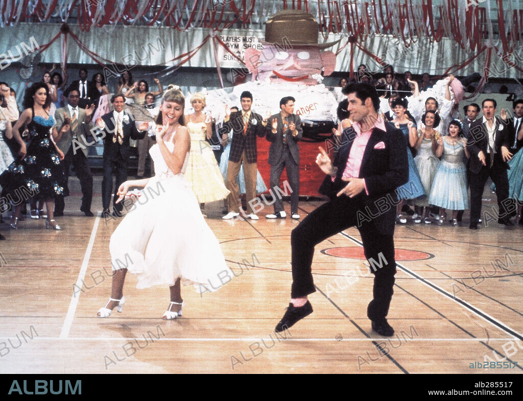 OLIVIA NEWTON JOHN et TRAVOLTA JOHN. JOHN TRAVOLTA et OLIVIA NEWTON-JOHN dans GREASE, 1978, réalisé par RANDAL KLEISER. Copyright PARAMOUNT PICTURES.