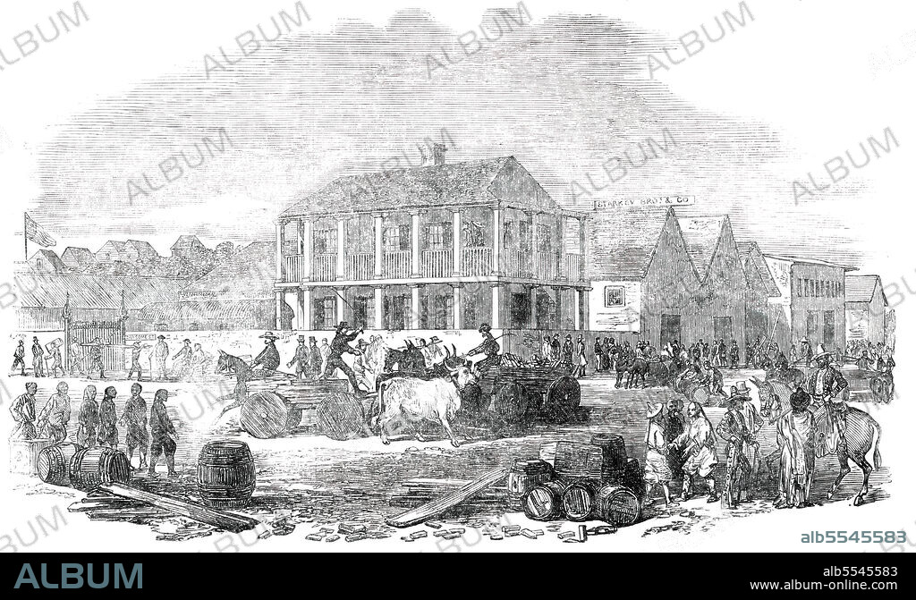 UNKNOWN. Street View in San Francisco, from a sketch by a correspondent, 1850. The California Gold Rush brought a flood of "forty-niners" to San Francisco. The population jumped from 1,000 in 1848, to 25,000 a year later. 'On one side of the picture is the beach; and in front are the extensive premises of Starkey, Brothers, and Co., including a large iron warehouse, the first erection of the kind in California. The motley population in the street includes Chinese labourers, Yankees, and natives driving bullock-carts; whilst on horseback is a Californian Mexican, in the rich and picturesque costume of the country'. From "Illustrated London News", 1850.