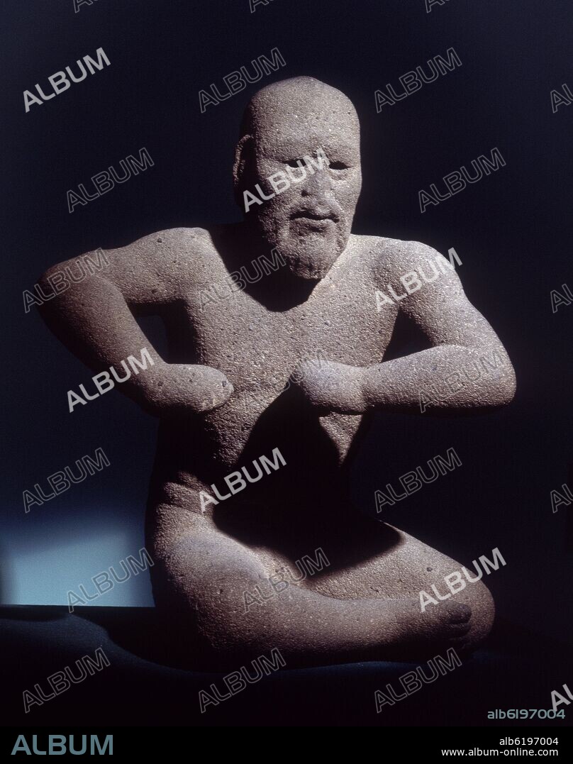 EL LUCHADOR O EL HOMBRE BARBADO - PROCEDENTE DE LA REGION DE MINATITLAN (VERACRUZ) - CULTURA OLMECA - 600-100 AC.