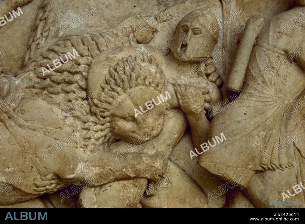 Siphnian Treasury, ca. 525 BC. Marble of Paros. North frieze depicting a Gigantomachy. A lion biting a giant. Archaeological Museum of Delphi, Greece.