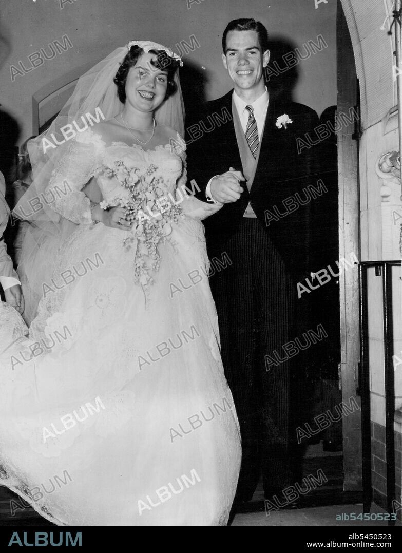 Spencer-Lynch Wedding -- Peter Spencer, son of the Australian Ambassador and Lady Spencer, and his bride - formerly Miss Ann Foster Lynch, daughter of Captain and Mrs. Charles Francis Lynch (U.S.N.,) leaving the church following their marriage at Christ Episcopal Church, Georgetown, Washington D.C. July 02, 1954. (Photo by Reni Photos).