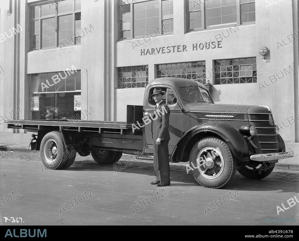 Negative - International Harvester, Keith Rigg & D40 Truck Outside Harvester House, City Road, South Melbourne, 1940, Part of a large collection of glass plate and film negatives, transparencies, photo albums, product catalogues, videos, motion picture films, company journals, advertisements and newspaper cuttings relating to the operations of the International Harvester Company and its subsidiaries in Australia. The International Harvester Company of America was formed in 1902 by the merger of five leading.