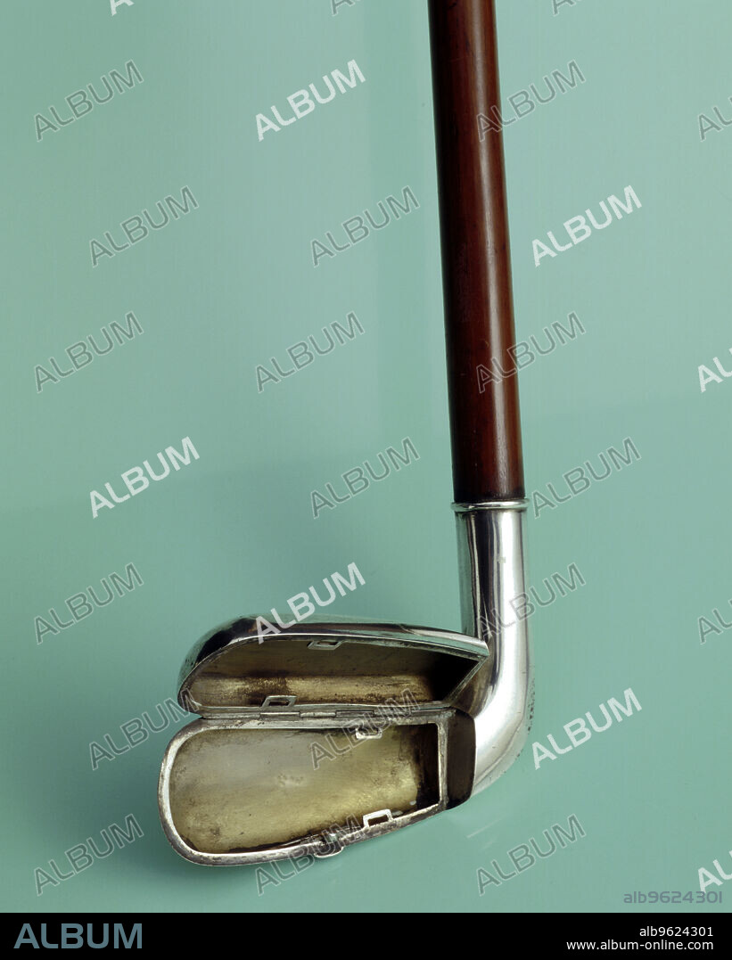 Silver cigarette case walking stick designed to look like a golf club, c1910.