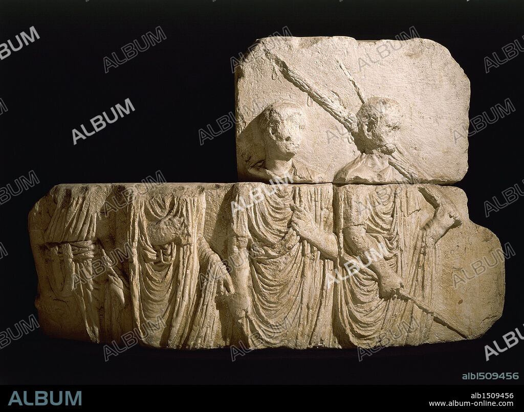 Roman civilization, 1st century A.D.  Relief depicting a magistrate, a lictor and two characters. Copy of the relief of the Palazzo Comunale (town hall) of Osimo.