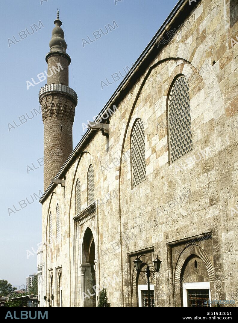 Turkey. Asia Minor. Bursa. Grand Mosque of Bursa (Ulu Camii). It was built in Seljuk style between 1396-1399. Its construction was ordered by the Ottoman Sultan Bayesid I. Facade and minaret.