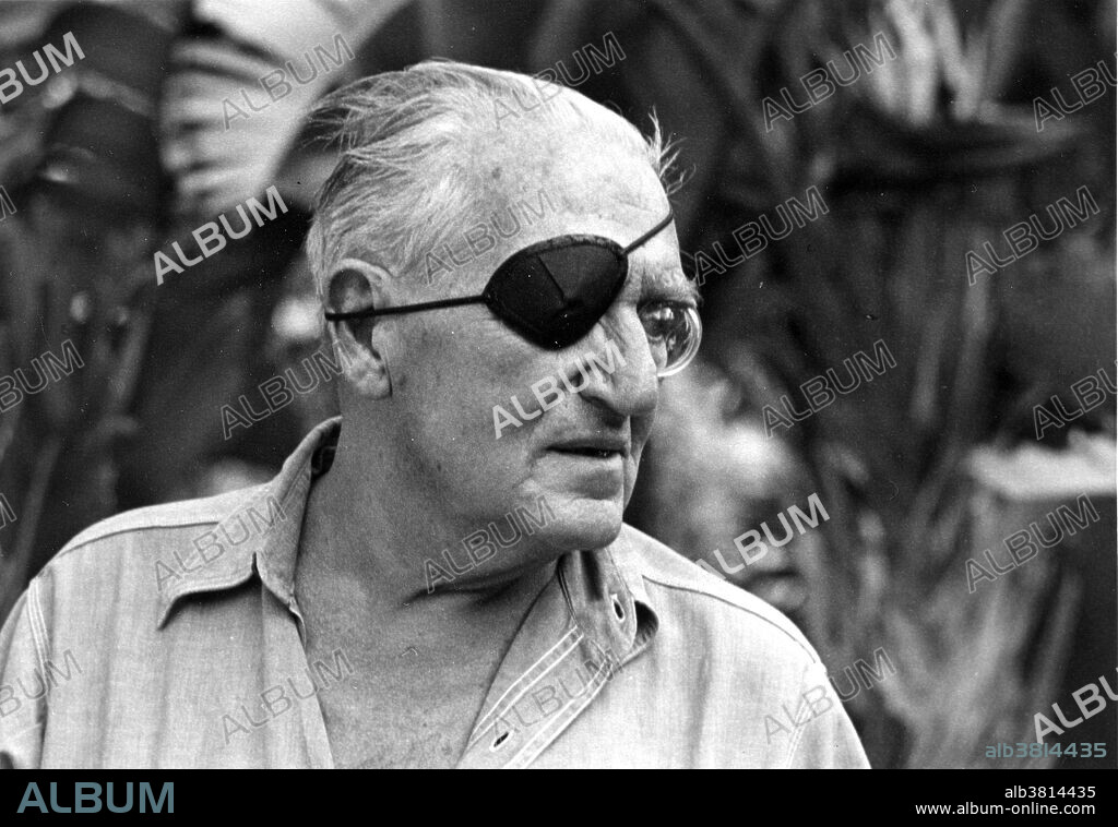Fritz Lang (1890-1976) in Beverly Hills, 1965. Lang was a Austrian filmmaker, screenwriter, and occasional film producer and actor. One of the best known Ã©migrÃ©s from Germany's school of Expressionism, he was dubbed the "Master of Darkness" by the British Film Institute. His most famous films include the groundbreaking Metropolis (the world's most expensive silent film at the time of its release), and M, made before he moved to the United States, which is considered the precursor to the film noir genre.