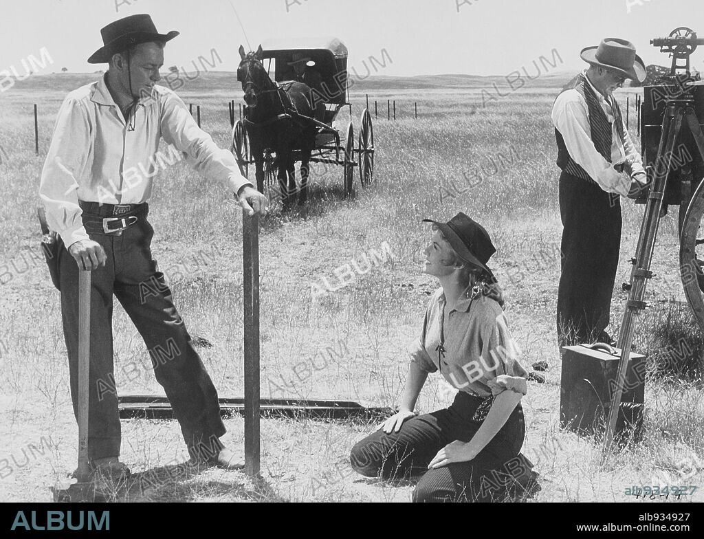 ALAN LADD und VIRGINIA MAYO in THE BIG LAND, 1957, unter der Regie von GORDON DOUGLAS. Copyright WARNER BROTHERS.