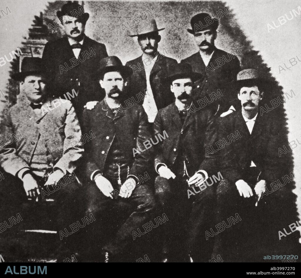 The Dodge City Peace Commission, Kansas, USA, June 1883. Standing: WH Harris, Luke Short, Bat Masterson; sitting: Charles E Bassett, Wyatt Earp, Frank McClain and Neal Brown. The Dodge City Peace Commission was a group of gunfighters assembled by Earp and Masterson to support Short, who purchased a half share in a saloon in the notoriously lawless town of Dodge City, Kansas, in 1883. An iconic figure in the story of the American West, Wyatt Earp is best remembered for his career as a lawman and his involvement in the notorious Gunfight at the OK Corral in 1881.