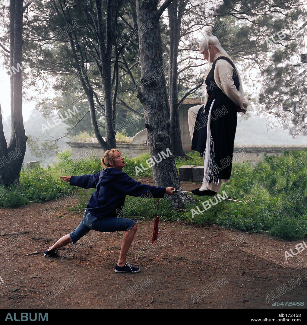 CHIA HUI LIU and UMA THURMAN in KILL BILL: VOL. 2, 2004, directed by QUENTIN TARANTINO. Copyright MIRAMAX / COOPER, ANDREW.