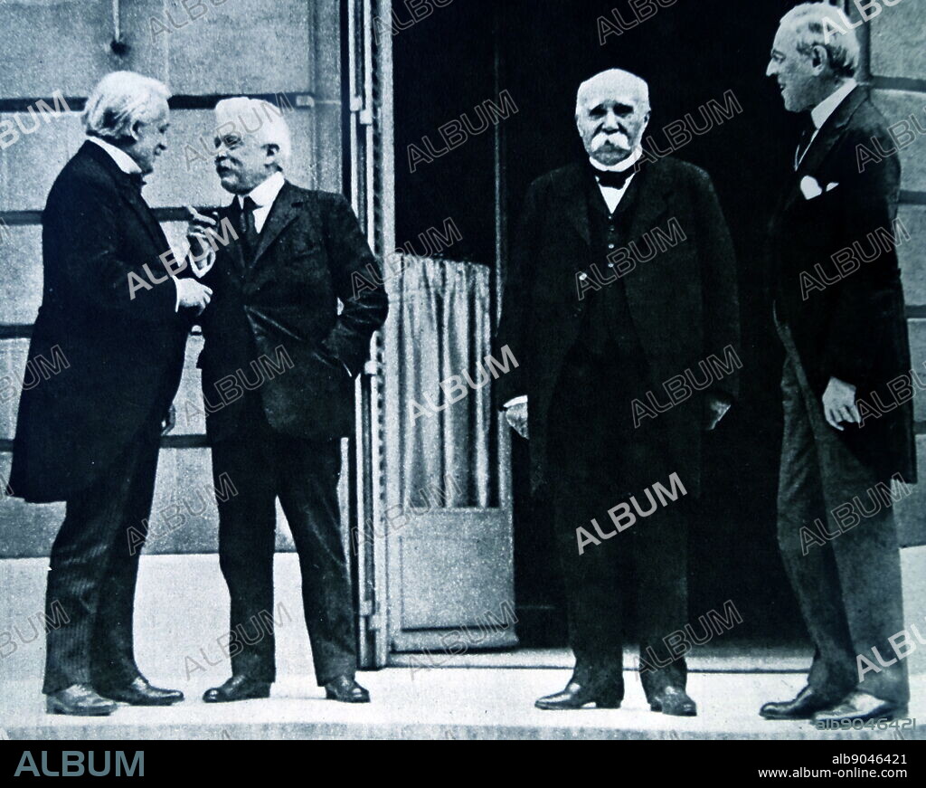 (Left to Right): British Prime Minister, David Lloyd George, Italian Prime Minister, Vittorio Emanuele Orlando, French Premier, Georges Clemenceau and US President, Woodrow Wilson chat during a break at the Versailles Peace Treaty negotiations. 1919.