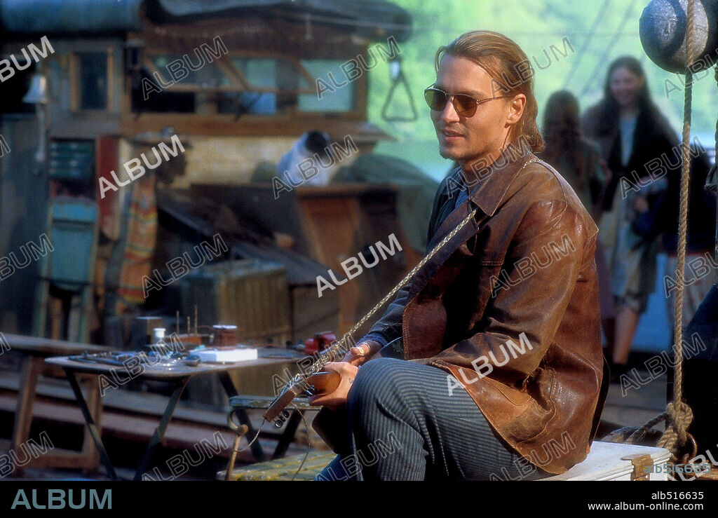 JOHNNY DEPP in CHOCOLAT, 2000, directed by LASSE HALLSTROM. Copyright MIRAMAX FILMS.