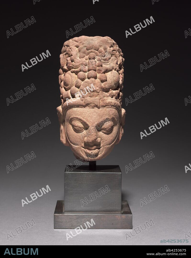 Head of Surya, c. 6th century. India, Mathura, Post-Gupta period. Spotted red sandstone; overall: 16 x 8.5 x 12 cm (6 5/16 x 3 3/8 x 4 3/4 in.).