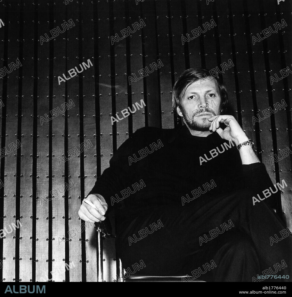 Portrait of Umberto Orsini. The Italian actor Umberto Orsini smoking a cigarette. Milan, December 1969.