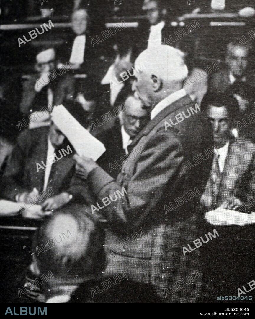 Black and white photograph of French Marshal Philippe Petain (1856-1951) during his trial for treason, pictured on 25 September 1945.