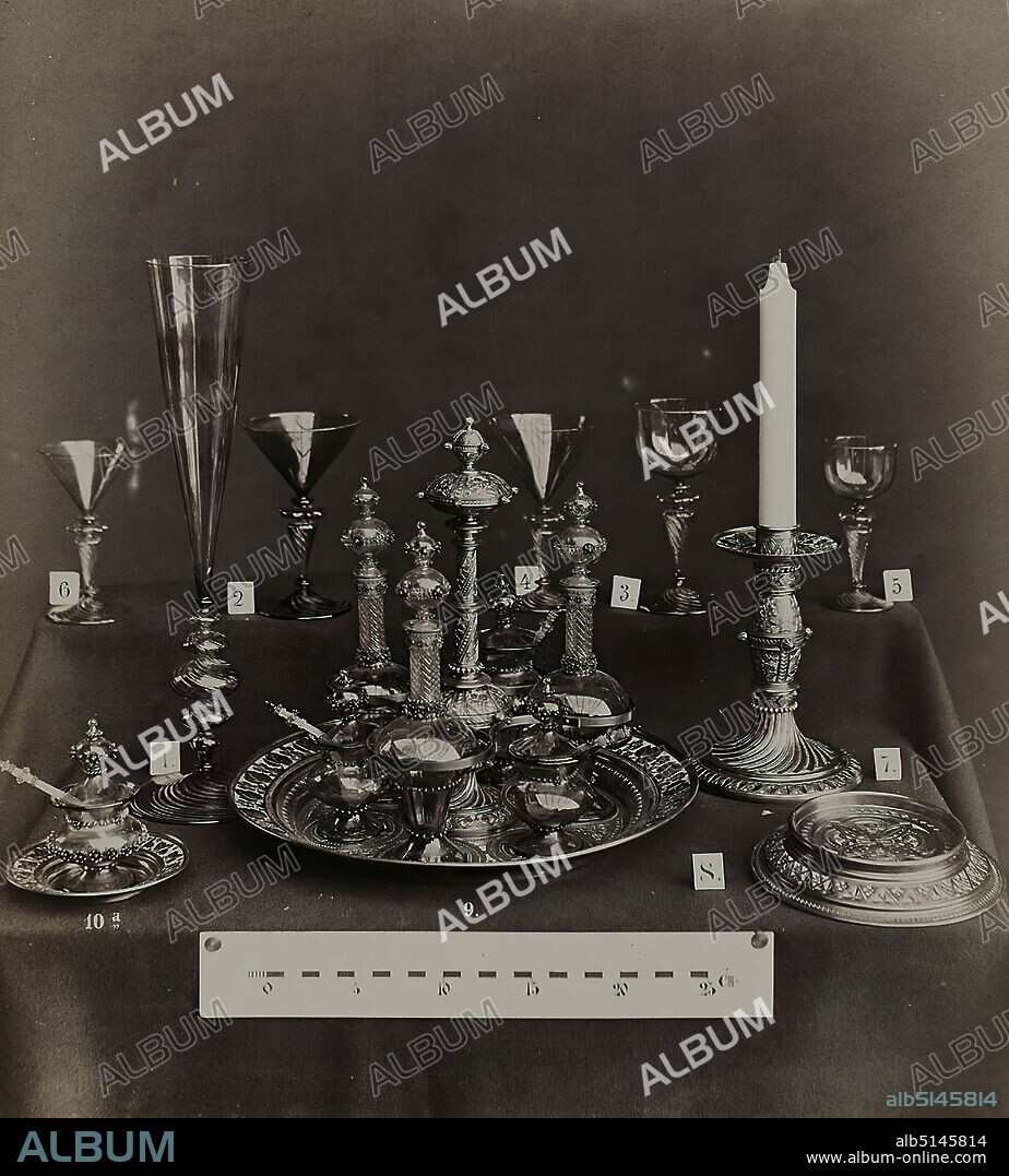 G. Koppmann & Co, Georg Koppmann, glasses, vessels and candlesticks of the Kunstgewerbliche Werkstatt in Altona, albumin paper, black and white positive process, image size: height: 24 cm; width: 21,6 cm, dry stamp: recto and on the cardboard: G. KOPPMANN & Co, Photographen, Hamburg, 1879, inscribed: recto & on the carton: type print: Kunstgewerbliche Werkstatt in Altona, Bachstrasse Nr. 63, photography, handicraft, arts and crafts, industrial design, drinking vessels, candleholder, candelabra.