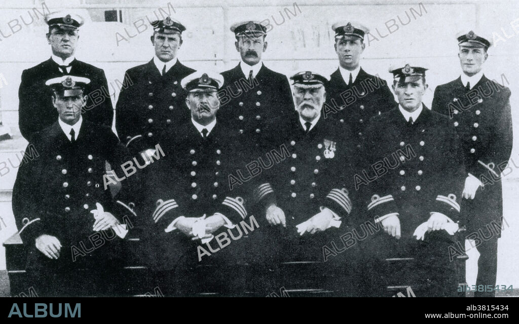 Captain Edward J Smith and his senior officers photographed on board RMS Titanic, April 1912. Back row from Left to Right: Herbert McElroy, Charles Lightoller (Second Officer), Herbert Pitman, Joseph Boxhall, Harold Lowe; Front row from Left to Right: James Moody, Henry Wilde (Chief Officer), Edward Smith, William Murdoch (First Officer). RMS Titanic, the largest ocean liner ever built at the time, was reputed to be unsinkable. However, during its maiden voyage it struck an iceberg in the North Atlantic on the night of 14 April 1912 and sank with the loss of 1517 lives.