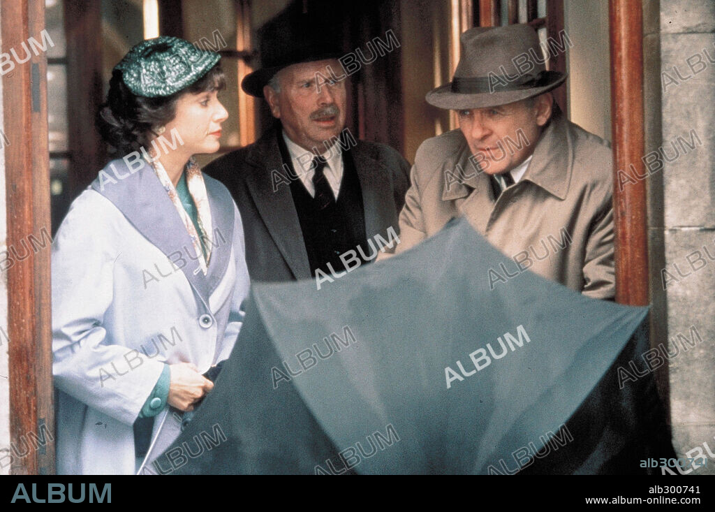 ANTHONY HOPKINS, DEBRA WINGER y EDWARD HARDWICKE en TIERRAS DE PENUMBRA, 1993 (SHADOWLANDS), dirigida por RICHARD ATTENBOROUGH. Copyright SAVOY PICTURES.