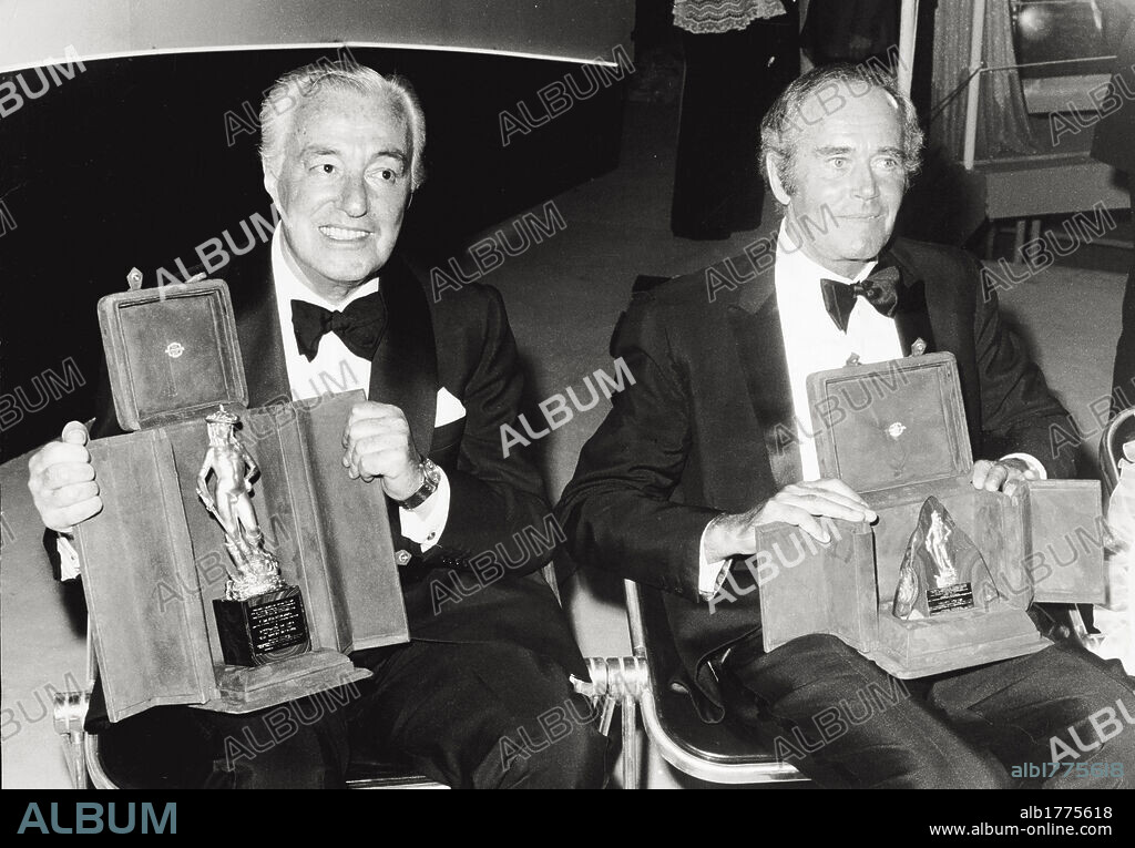 Vittorio De Sica and Henry Fonda are awarded with the 'David di Donatello' prize. The director and actor Vittorio De Sica (on the left) and the US actor Henry Fonda are photographed together in the ancient theatre of Taormina for the 18th edition of 'David di Donatello' Awards. The two artists have been awarded with the 'David Europeo' and with the 'David Speciale' respectively. Taormina (Messina), July 21, 1973.
