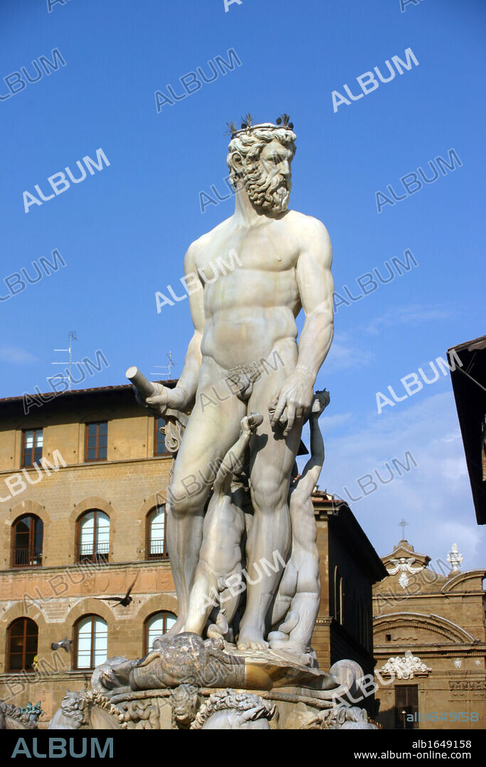Neptune, Roman gold of the Sea (Greek Poseidon). White marble sculpture on top of the fountain by Bartolomeo Ammanati (1511-1592) in the Piazza della Signoria, Florence, Italy. Male Nude.