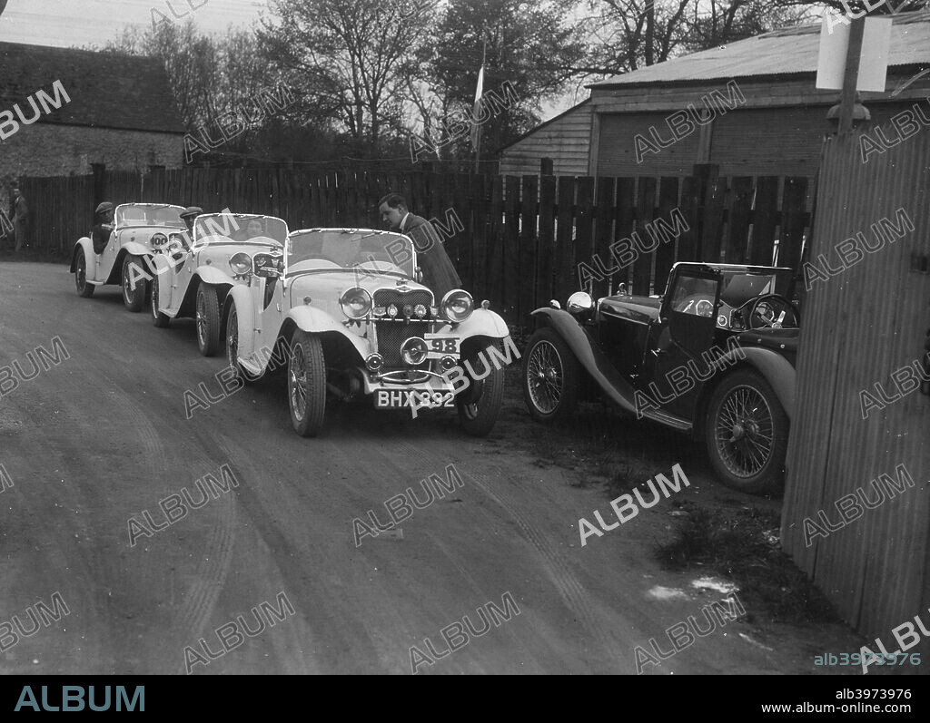 Singer Le Mans 1934 972 cc. Reg. No.  BHX332. Entry No: 98. Candidi Provocatores team car. Left of centre: Singer  972 cc. Entry No: 99. Left: Singer 972 cc. Entry No: 100. Right: MG PA 8.