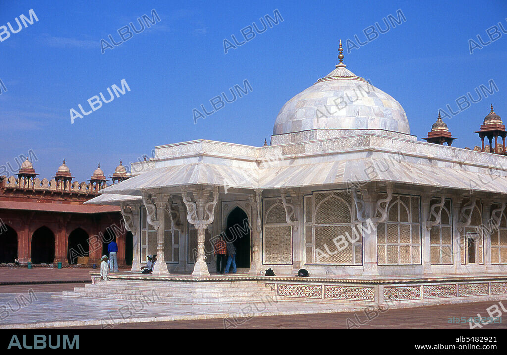 Salim Chishti (1478 1572) was a Sufi saint of the Chishti Order during the Mughal Empire (1526 - 1757) in South Asia. Chishti's tomb was originally built with red sandstone but later converted into a beautiful marble mausoleum. Salim Chishti's Mazar (tomb) is in the middle of the Emperor's Courtyard at Fatehpur Sikri. The mausoleum was constructed by Akbar as a mark of his respect for the Sufi saint, who foretold the birth of his son, who was named Prince Salim after him and later succeeded Akbar to the throne of the Mughal Empire, as Jahangir. Fatehpur Sikri (the City of Victory) was built during the second half of the 16th century by the Emperor Akbar (r. 1556-1605). It was the capital of the Mughal Empire for 10 years.