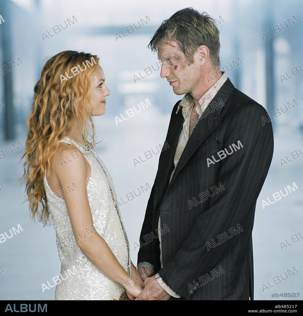 JASON FLEMYNG and VANESSA PARADIS in THE RETURN OF JAMES BATTLE, 2004 (ATOMIK CIRCUS-LE RETOUR DE JAMES BATAILLE), directed by DIDIER POIRAUD and THIERRY POIRAUD. Copyright TF1 FILMS PRODUCTIONS.