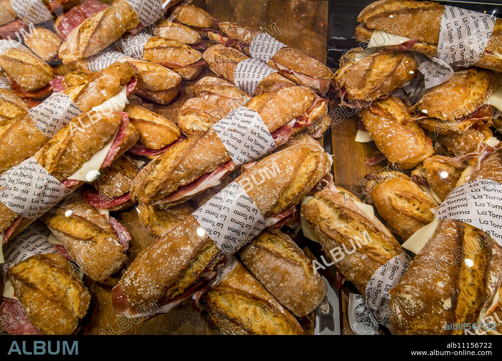 Ham and cheese bread rolls for sale at the Mercat de Sant Josep de la Boqueria, Barcelona's most famous market, Barcelona, Catalonia, Spain, Europe.