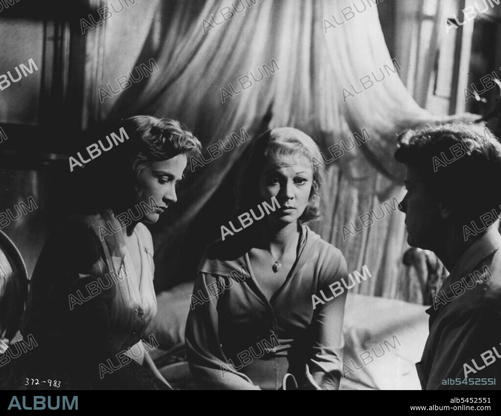 "A Streetcar Named Desire." -- A few days later Stella and Eunice help Blanche prepare for her Journey. Blanche still thinks she is going on a cruise with her admirer, hut Stella and Eunice know the truth.Stella says she doesn't want to believe the story Blanche has told her, otherwise she couldn't go on living with Stanley. That's why Blanche has got to go.Blanche has one more tormented, meeting with "Mitch". Her talk becomes more and more confused as she prepares to start on her way, Stanley, Mitch and the other poker players also know where Blanche is going. August 07, 1951.