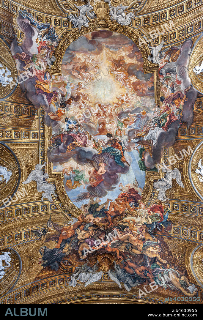Church of Jesus, the interior: view of the vault of the nave with "The Triumph in the Name of Jesus", fresco by Giovan Battista Gaulli known as Baciccia, 1679. The golden cornice and the plasters are by Ercole Antonio Raggi.