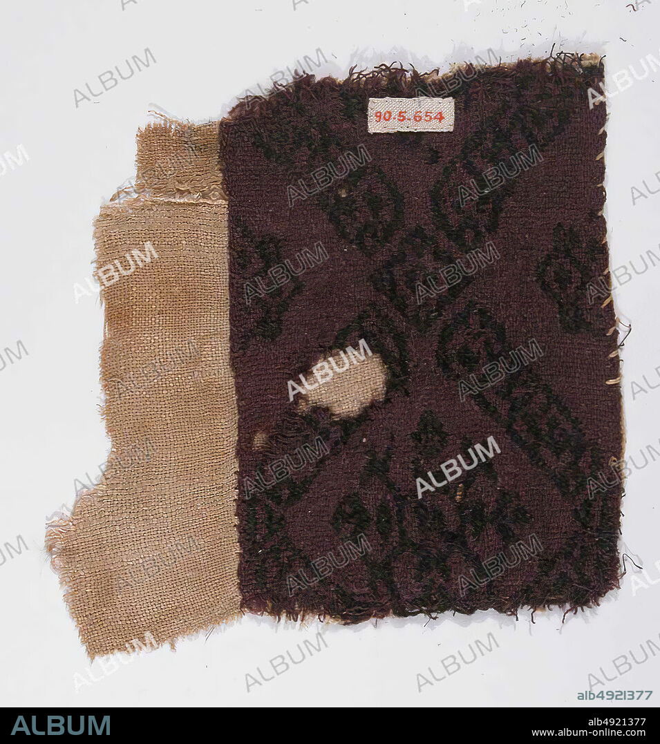 Fragment, 5th6th century, Attributed to Egypt, Akhmim (former Panopolis), Wool; plain weave, brocaded (?), 5 3/8 in. high 3 3/4 in. wide (13.6 cm high 9.5 cm wide), Textiles.