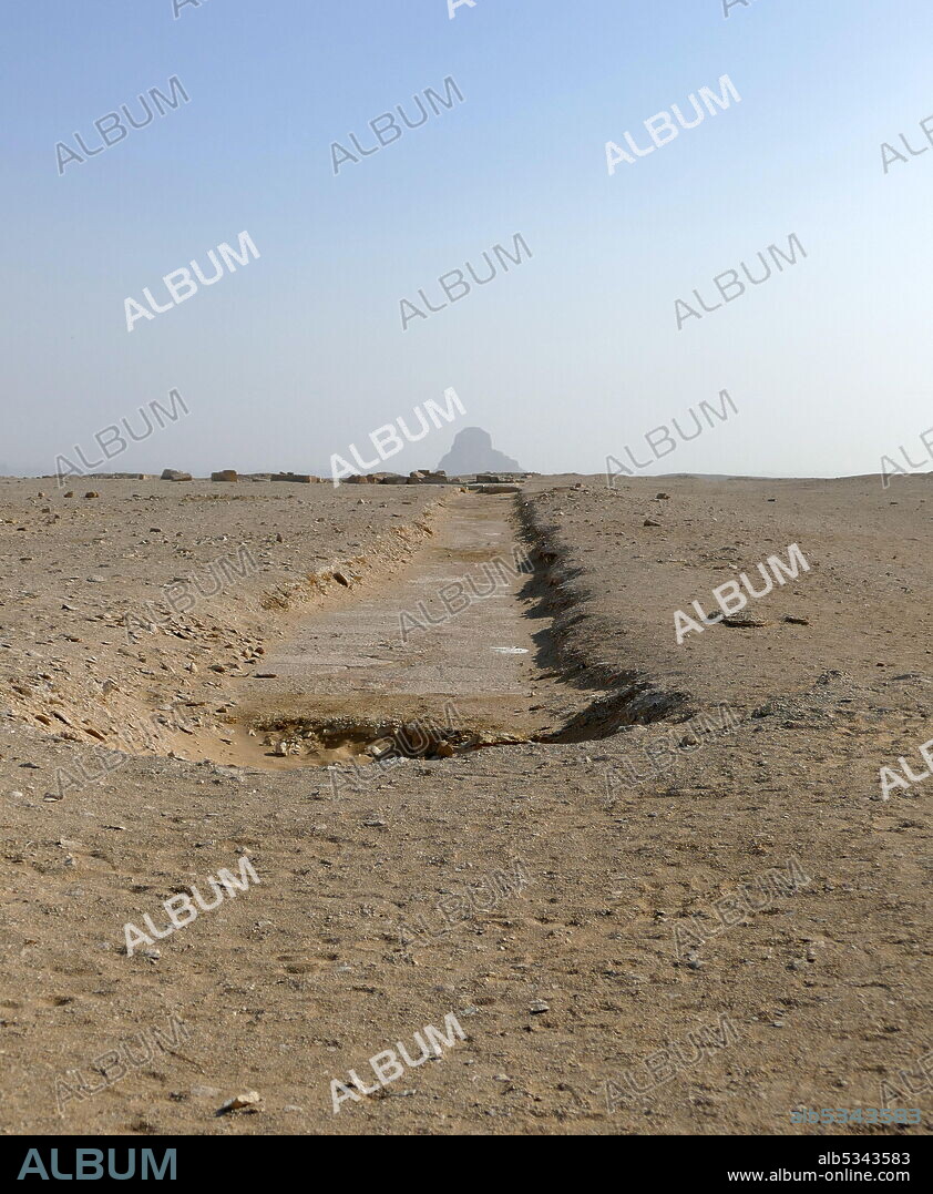The Pyramid of Amenemhat III, at Dasher, Egypt. The Black Pyramid was built by King Amenemhat III during the Middle Kingdom of Egypt (2055-1650 BC). It is one of the five remaining pyramids of the original eleven pyramids at Dahshur in Egypt. Originally named Amenemhat is Mighty, the pyramid earned the name 'Black Pyramid' for its dark, decaying appearance as a rubble mound. The Black Pyramid was the first to house both the deceased pharaoh and his queens.