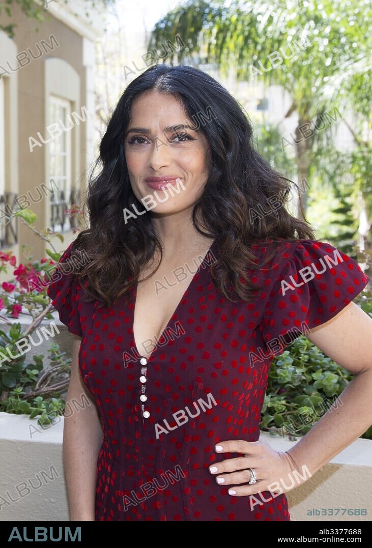 SALMA HAYEK. April 1, 2017 - Hollywood, California, U.S. - SALMA HAYEK promotes 'How to be a Latin Lover' Salma Hayek (born September 2, 1966) is a Mexican-American film actress, producer, and former model. She began her career in Mexico starring in the telenovela Teresa and starred in the film El Callejon de los Milagros (Miracle Alley) for which she was nominated for an Ariel Award. In 1991 Hayek moved to Hollywood and came to prominence with roles in movies such as Desperado (1995), From Dusk Till Dawn (1996), Dogma (1999), and Wild Wild West (1999). Her breakthrough role was in the 2002 film Frida as Mexican painter Frida Kahlo for which she was nominated in the category of Best Actress for an Academy Award, BAFTA Award, Screen Actors Guild Award, and Golden Globe Award. This movie received widespread attention and was a critical and commercial success. She won a Daytime Emmy Award for Outstanding Directing in a Children/Youth/Family Special in 2004 for The Maldonado Miracle and received an Emmy Award nomination for Outstanding Guest Actress in a Comedy Series in 2007 after guest-starring in the ABC television comedy-drama Ugly Betty. She also guest-starred on the NBC comedy series 30 Rock from 2009 to 2013. Hayek's recent films include Grown Ups (2010), Puss in Boots (2011), Grown Ups 2 (2013), and Tale of Tales (2015).The Hitman's Bodyguard (2017), How to Be a Latin Lover (2017), Drunk Parents (2017), Beatriz at Dinner (2017. 01/04/2017