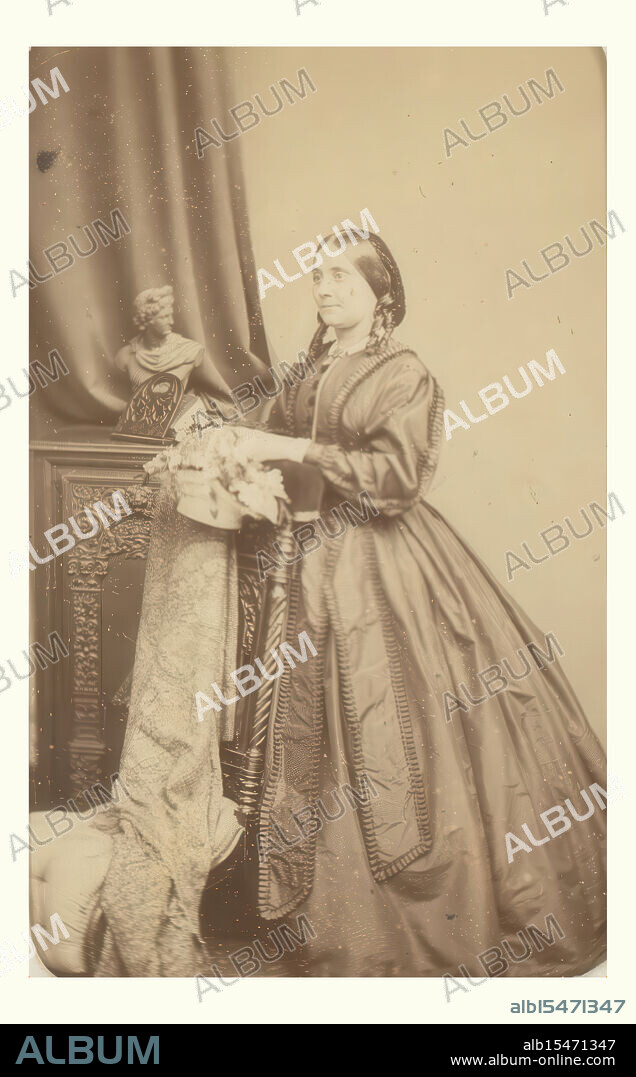 Lavis, Rebecca, George, G. and R., Portrait of a Standing Woman, verso - printed, This photograph is part of an album., photograph, foto, carte-de-visite, albumblad, foto's, G & R Lavis, Photographers &, Miniature Painters, 135, Regent St, W., height 102 mm, width 62 mm, photographer, 1860 - 1890, photographic paper, fotopapier, cardboard, kaart, albumen print, albuminedruk, Engels, 1831 - 1875, 1827.