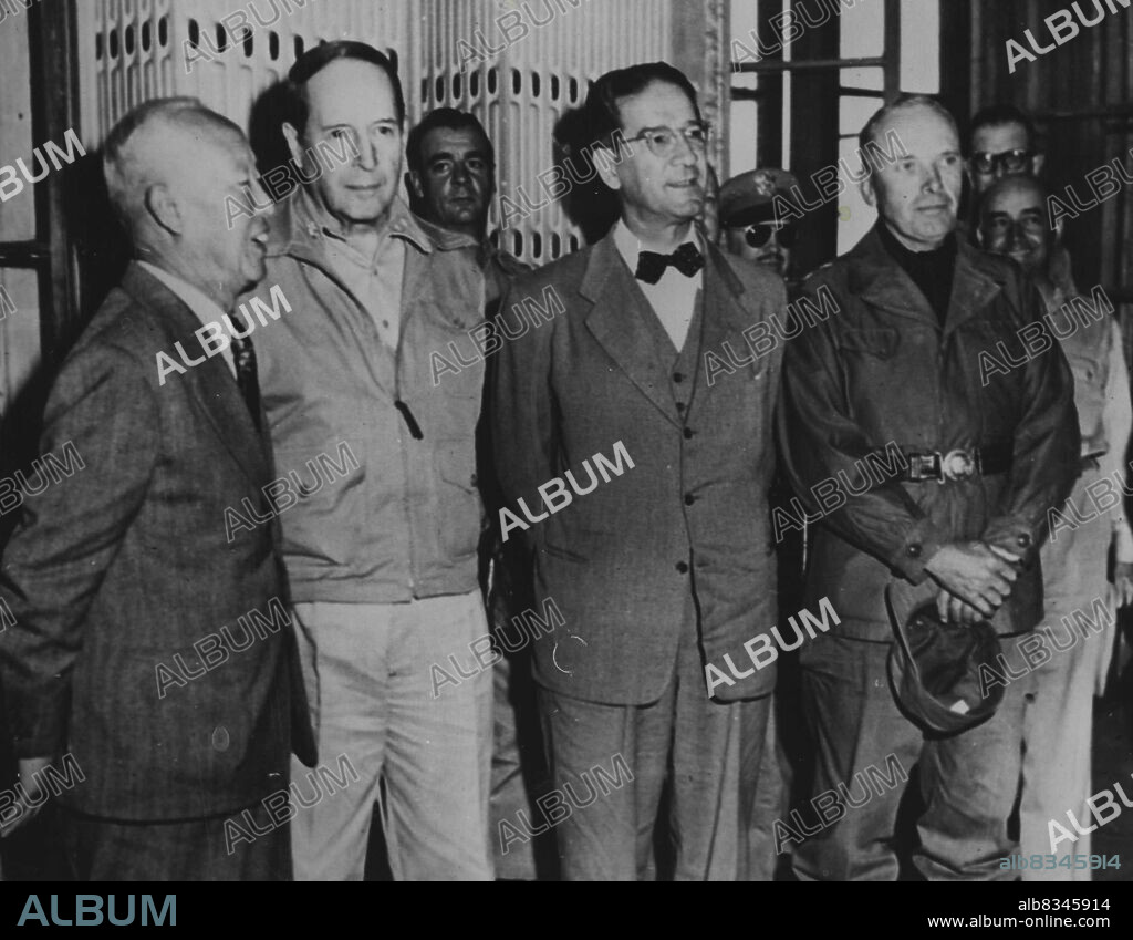 A Conference In Korea -- From left:- Syngman Rhee, President of the Korean Republic; General Douglas MacArthur, Commander-in-chief U.N. Forces in Korea; John Muccio, U.S. Ambassador to Korea; and Major General Edward M. Almond, commanding General X. Corps, confer at the Capitol building in Seoul, Korea, prior to ceremonies held to restore the capital of the Korean Republic to President Rhee. October 19, 1950. (Photo by Paul Popper Ltd).