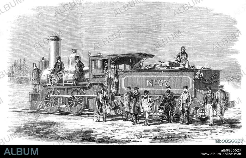 The "George Stephenson" locomotive engine built at Hamilton, Canada West, for the Great Western Railway of Canada, 1860. 'Mr. F.W. Gates, one of the directors; Mr. Thomas Reynolds, financial director; Mr. Brydges, managing director; Mr. G.H. Mingaye, paymaster; Mr. Richard Eaton, locomotive superintendent; Mr. W.C. Stephens, secretary in Canada; Mr. George Forsyth, [designer; Mr. A. Ayres, mechanical draughtsman, standing in front of] an engine of great power and beauty of workmanship...appropriately named after the father of railways...The cylinders are 16 inches in diameter, with a 24-inch stroke. The total heating surface, by an ingenious arrangement of the firebox, is 1218 superficial feet...it is adapted to burn either coal or wood...the framing is made from old scrap iron about the works reforged by steamhammer...The driving-wheels are six in number, coupled by threes...Forsyth...stands under the tender, with his hands in his velveteen jacket - a true specimen of the English mechanic...It will be observed that a roof covers the footplate where the engine-driver and stoker usually stand, rendered necessary from the inclemency of the winter and from the heat of the summer'. From "Illustrated London News", 1860.