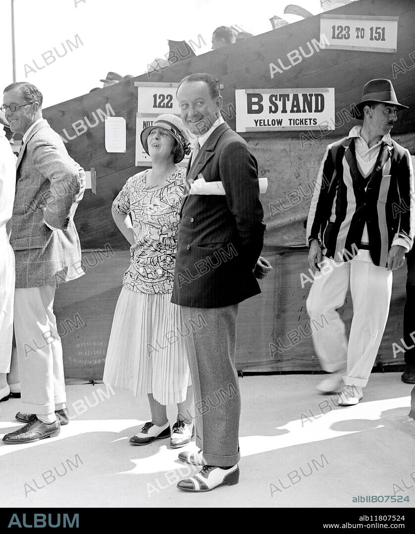 19th Open Lawn Tennis Tournament at Frinton. Captain Herbert Buckmaster ( husband of Gladys Cooper ) and Mrs Southey. 1925.