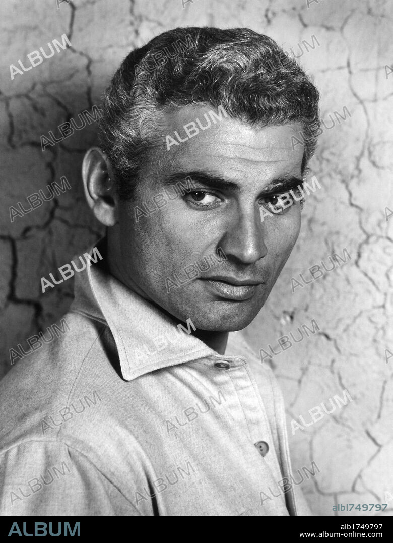 JEFF CHANDLER in FOXFIRE, 1955, directed by JOSEPH PEVNEY. Copyright UNIVERSAL PICTURES.