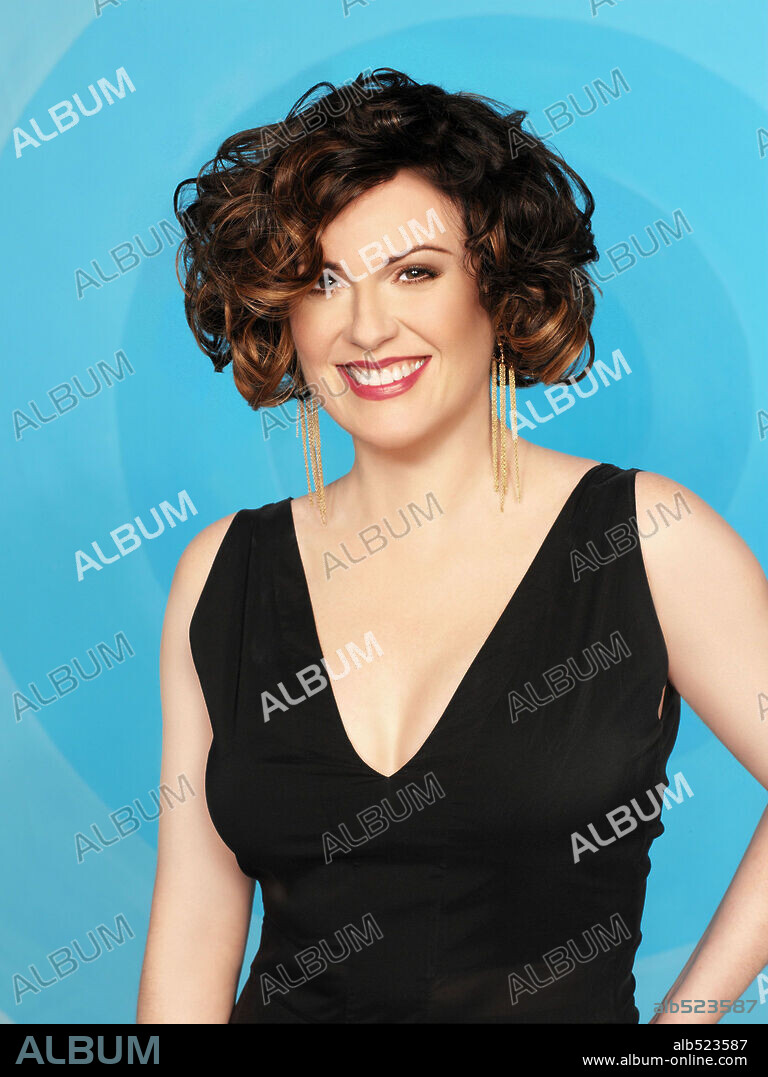 MEGAN MULLALLY in WILL & GRACE, 1998, directed by JAMES BURROWS. Copyright NBC.